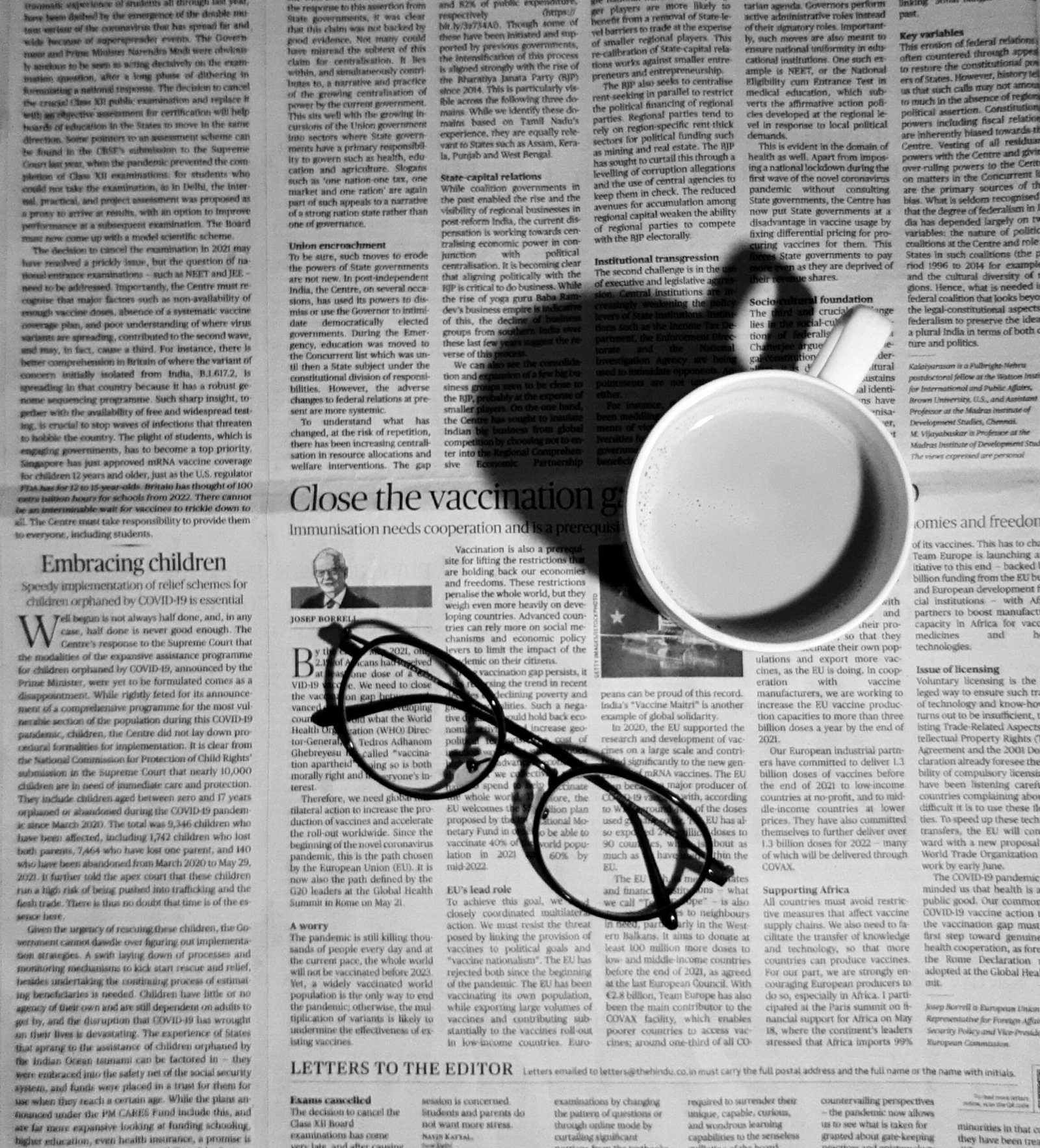 Stay Informed with the Latest News from Around the NCR a cup of coffee and a pair of glasses on a newspaper